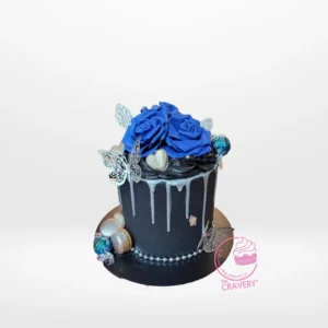 Cake and Roses – Romantic and elegant cake for celebrations in Birmingham. Cake and Roses – A romantic cake adorned with roses, butterflies, and bead strings, perfect for celebrations in Birmingham.