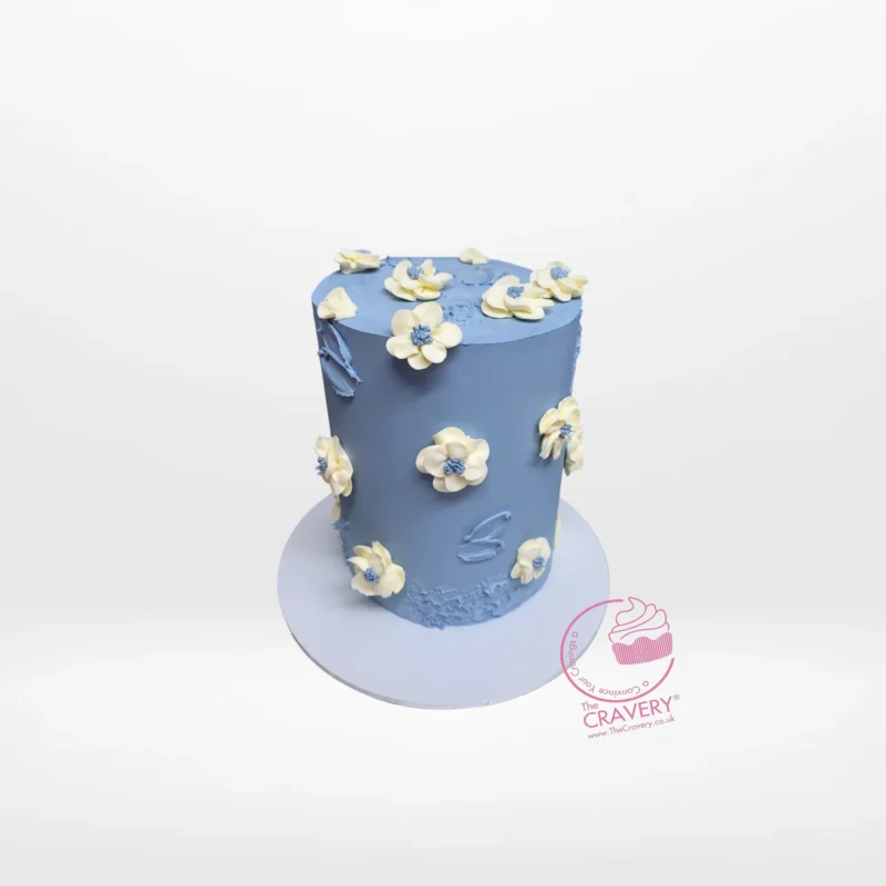 Daisies Cake – Stylish cake with fondant daisies for special occasions in Birmingham. Daisies Cake – A charming cake adorned with delicate daisy flowers, perfect for celebrations in Birmingham.
