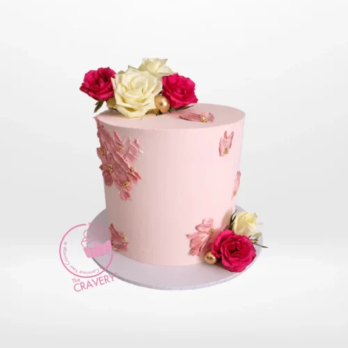Elegant Pink Birthday Cake with red roses and white pearls handcrafted at The Cravery, cake shop Wylde Green.