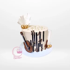 Guitar Cake – Music-inspired cake for celebrations in Birmingham. Guitar Cake – A custom guitar-shaped cake, perfect for music-themed celebrations in Birmingham.