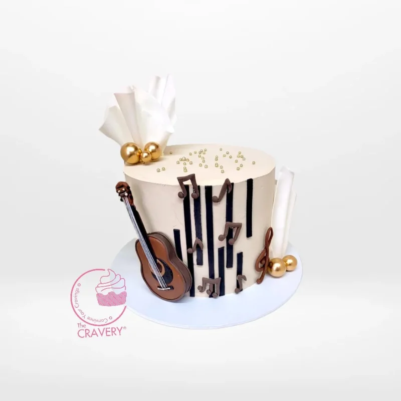 Guitar Cake – Music-inspired cake for celebrations in Birmingham. Guitar Cake – A custom guitar-shaped cake, perfect for music-themed celebrations in Birmingham.