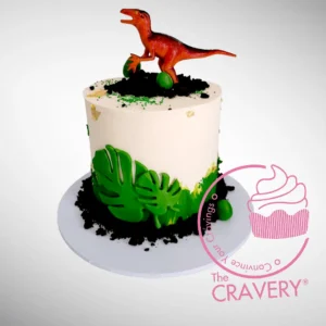 Simple Dinosaur Cake with non-edible dinosaur topper handcrafted by The Cravery, available for birthday cakes delivered in Birmingham.