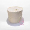 White on White Cake – A custom cake with intricate white decorations, available at our cake shop Birmingham.