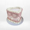 Mothers Day Cake Ideas – A beautiful Mother's Day cake adorned with edible blossoms and non-edible roses, perfect for celebrations in Solihull.