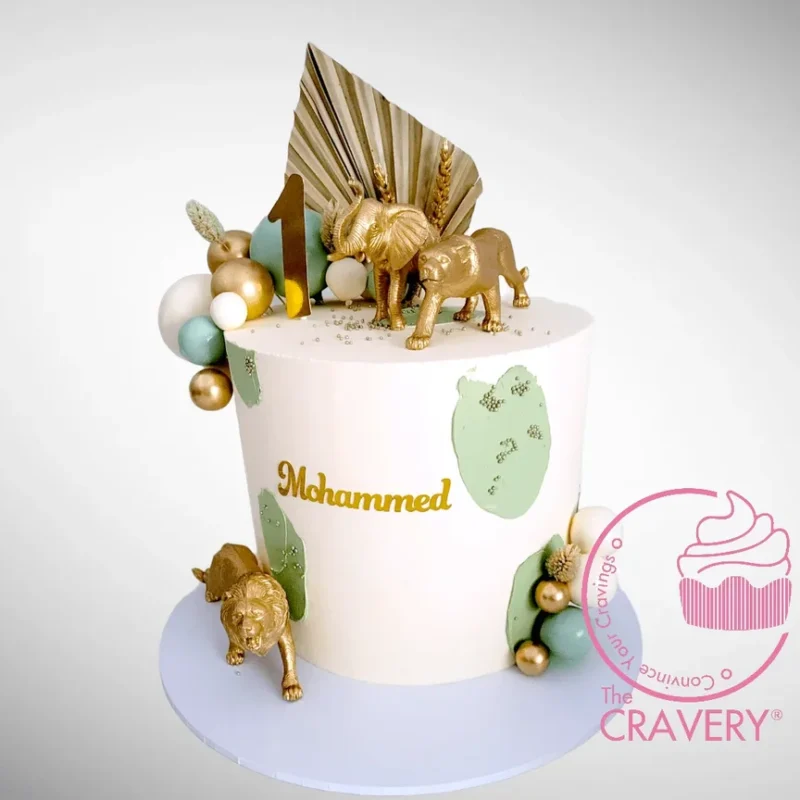 Safari Theme Cake | Cake Shop Bearwood Safari Theme Cake with golden animals handcrafted at The Cravery, cake shop in Bearwood.