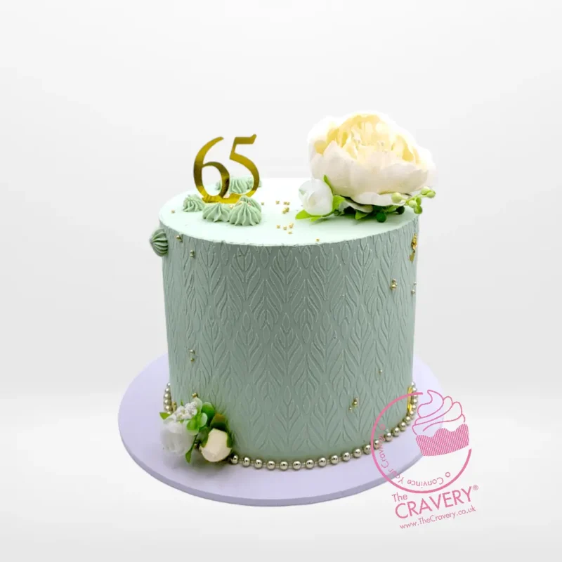65th Birthday Cake from Cravery’s Birthday Cake Delivery Birmingham Collections. A memorable creation for special milestones. 65th Birthday Cake from Cravery’s Birthday Cake Delivery Birmingham Collections. A bespoke creation adorned with non-edible flowers for your milestone celebration.