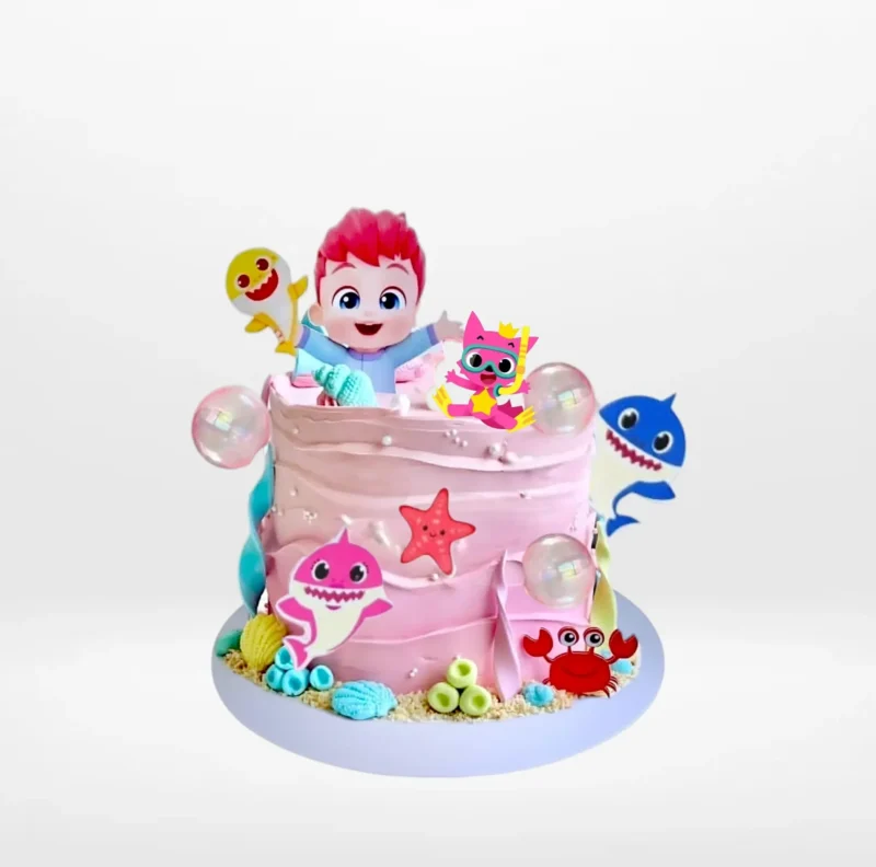 Babyshark Cake in Pink | The Cravery Cake Birmingham Babyshark Cake in Pink, themed children’s birthday cake from The Cravery Birmingham