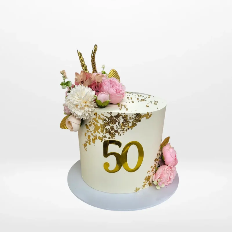Female 50th Birthday Cake Moseley, Elegant Bliss Female 50th Birthday Cake from Cravery’s cake shop Moseley with elegant floral and fan design.