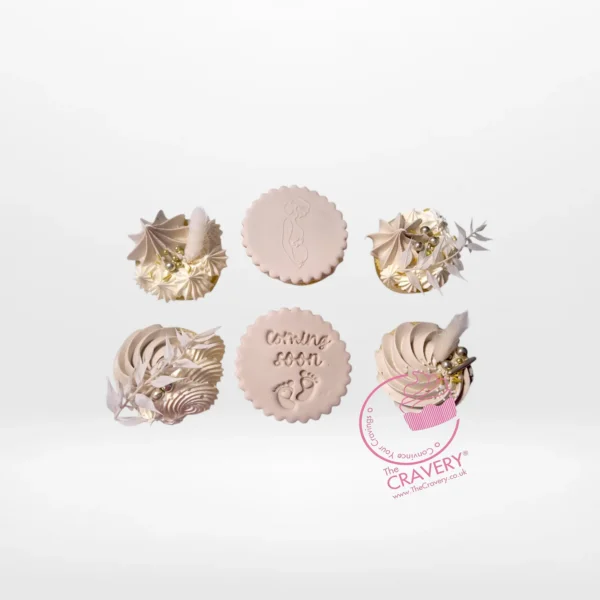 Baby Coming Soon cupcakes with pastel buttercream and baby themed edible decorations for Birmingham cupcakes customers.