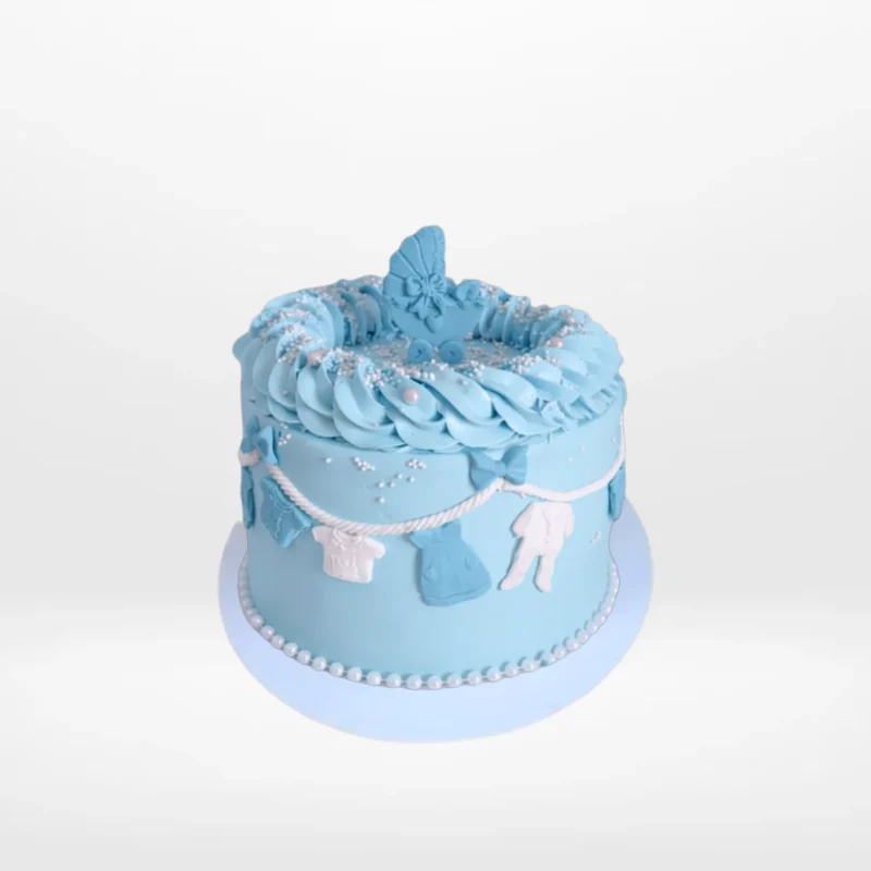 Babyshower Blue Cloths Line Cake by The Cravery | Cakes Delivered Birmingham Babyshower Blue Cloths Line Cake with baby-themed clothesline design handcrafted by The Cravery, available for cakes delivered in Birmingham.