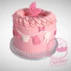 Pink Babyshower Cake decorated with clothes line theme, handcrafted by The Cravery Cake Makers in Solihull.