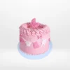 Pink Babyshower Cake decorated with clothes line theme, handcrafted by The Cravery Cake Makers in Solihull.