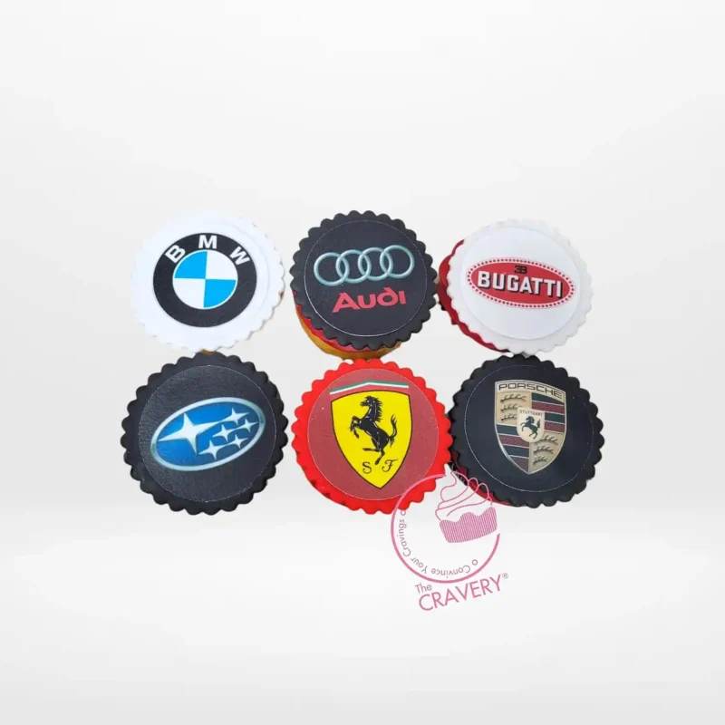 The Cravery’s Cars Cupcakes, handcrafted cupcakes with edible logos of Audi, Bugatti, Porsche, and BMW, baked fresh in Birmingham. Cars Cupcakes, The Cravery Birmingham