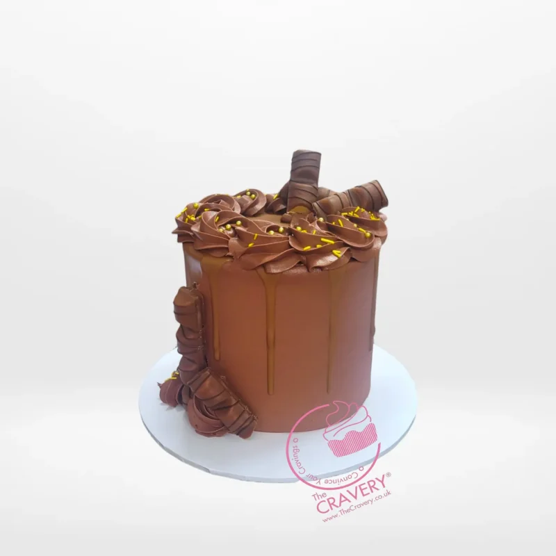 Elegant chocolate-buttercream cake from The Cravery in Moseley, featuring smooth brown tones and handcrafted detailing.