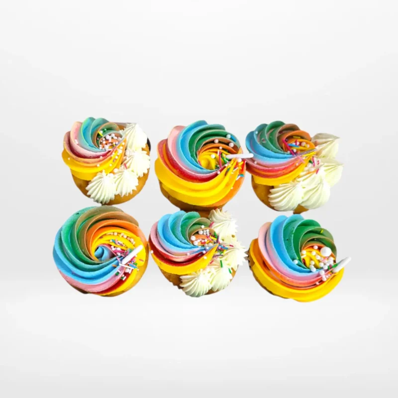 Cupcakes with Rainbows, The Cravery Birmingham Cupcakes with Rainbows by The Cravery, cupcakes topped with colourful rainbow swirl buttercream, freshly baked in Birmingham.