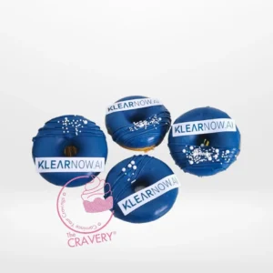 Branded doughnut with edible printed logo topper, freshly crafted for doughnut Birmingham events.