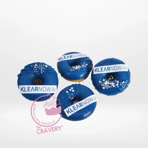 Branded doughnut with edible printed logo topper, freshly crafted for doughnut Birmingham events.