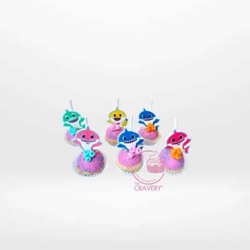 Baby Shark themed cake pops with colourful ocean-inspired decorations from a cake shop in Northfield.