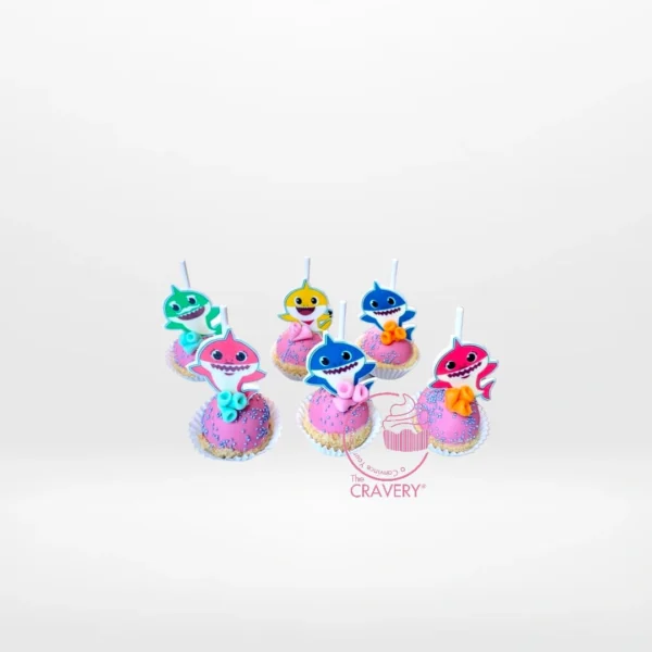 Baby Shark themed cake pops with colourful ocean-inspired decorations from a cake shop in Northfield.
