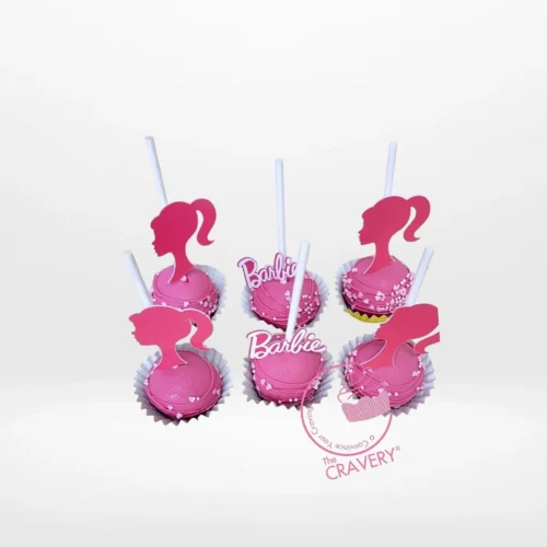 Pink Barbie themed cakepops handcrafted at a cake shop in Birmingham city centre.