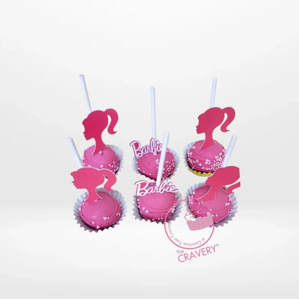 Pink Barbie themed cakepops handcrafted at a cake shop in Birmingham city centre.