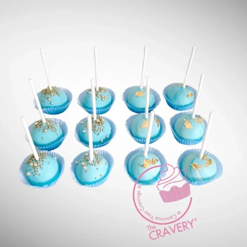 Blue cakepops with elegant decorative finishes handcrafted at a cake shop in Bearwood.