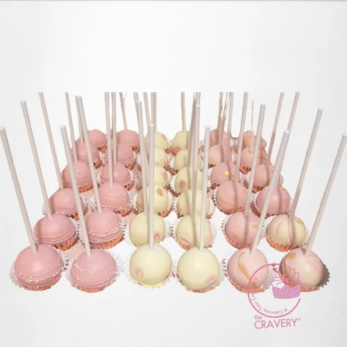 Cake pop cake featuring decorated cake pops arranged on a themed cake from a cake shop in Solihull.