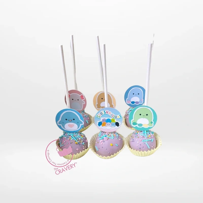 Squishmallows Cake Pop Cake, Birthday Cakes Birmingham Squishmallows themed cake pop cake with colourful character cake pops for birthday celebrations in Birmingham.