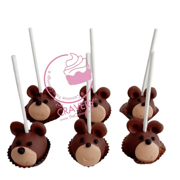 Bear themed cake pops with cute edible details handcrafted at a cake shop in Bearwood.