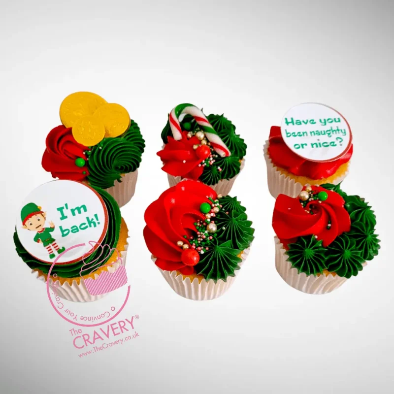 Elf themed Christmas cupcake with festive buttercream and edible decorations from a cake shop in Birmingham.