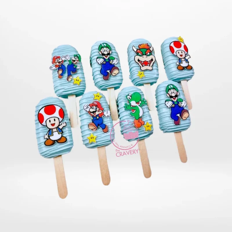 Mario Mini Cakesicles, Cake Shop Birmingham Mario Mini Cakesicles handcrafted at a cake shop in Birmingham.
