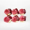 Rose cupcake with delicately piped buttercream petals, handcrafted for Birmingham cupcakes customers.