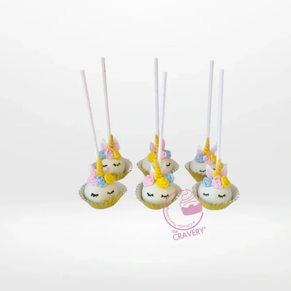 Unicorn themed cake pop with pastel colours and gold horn from the best cake shop in Birmingham.