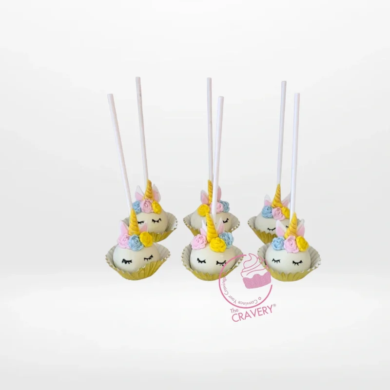 Unicorn Cake Pop, Best Cake Shop Birmingham Unicorn themed cake pop with pastel colours and gold horn from the best cake shop in Birmingham.