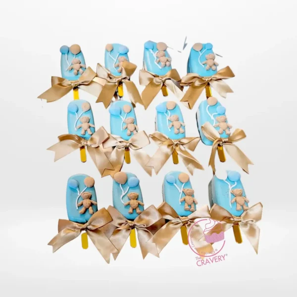 Mini bear-themed cakesicles handcrafted at a cake shop in Birmingham.