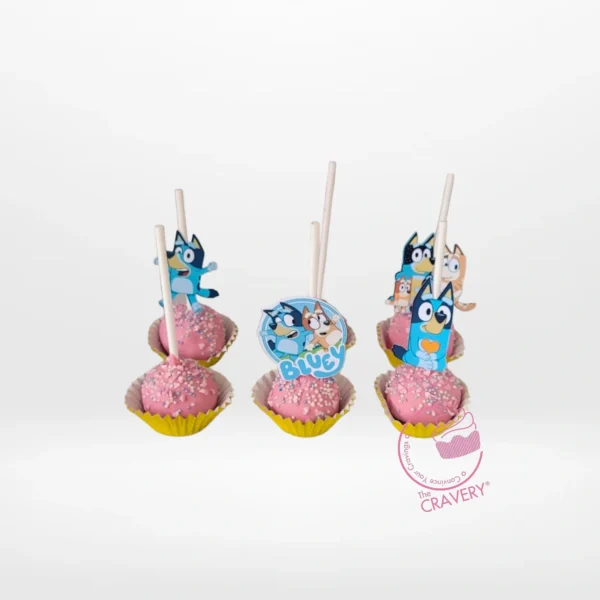 Bluey and Bingo themed cake pops with colourful character details for birthday cake delivery in Birmingham.