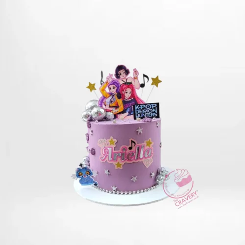 K Pop Demon Hunter Cake themed cake with bold colours and custom decorations from a cake shop in Birmingham.