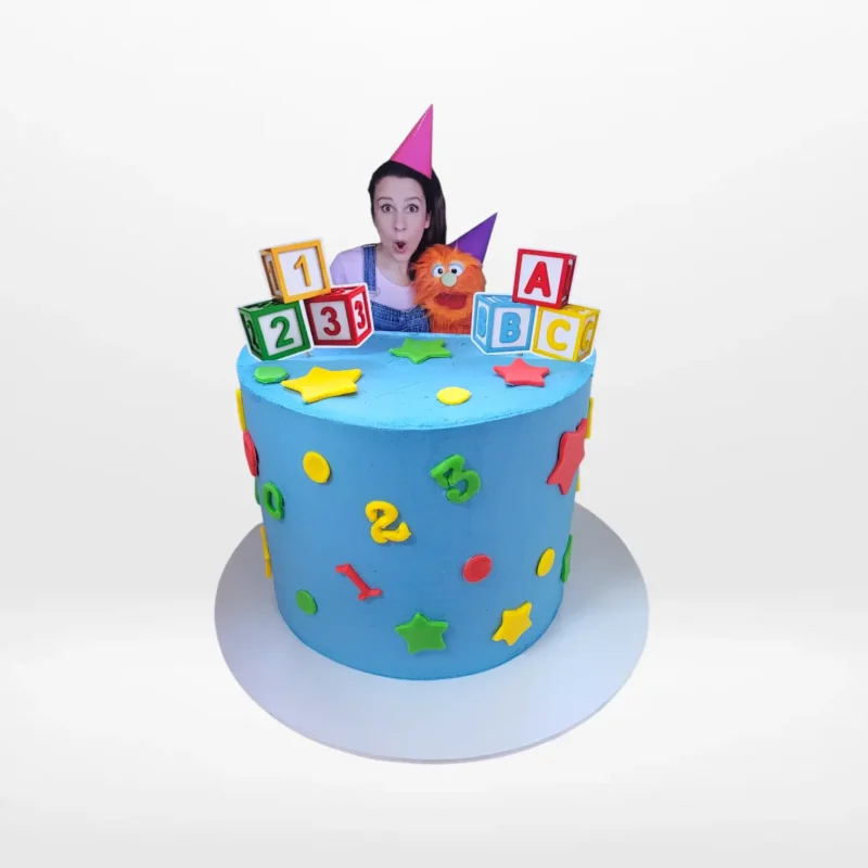 Miss Rachel Birthday Cake Birmingham Miss Rachel themed birthday cake with colourful design and character styling made in Birmingham.
