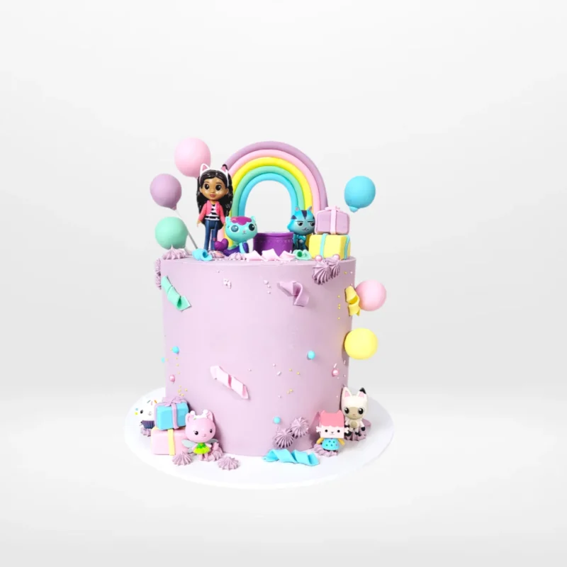 Gabby Dollhouse Cake Birmingham Gabby Dollhouse themed cake with colourful design and playful decoration made in Birmingham.